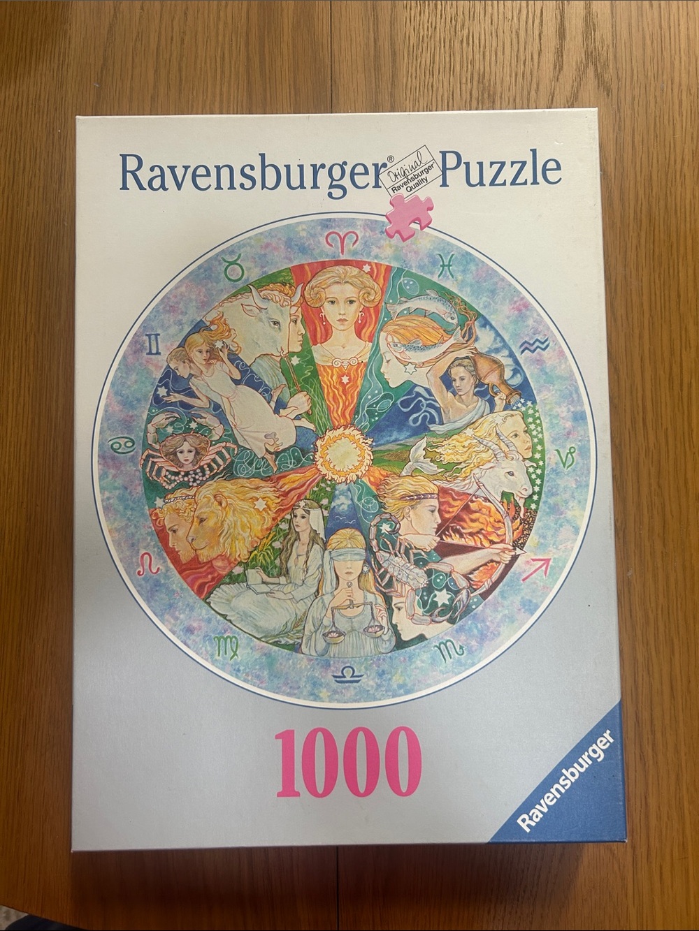 Ravensburger Zodiac Wheel Puzzle - Pink, Blue, Green, Yellow gently used